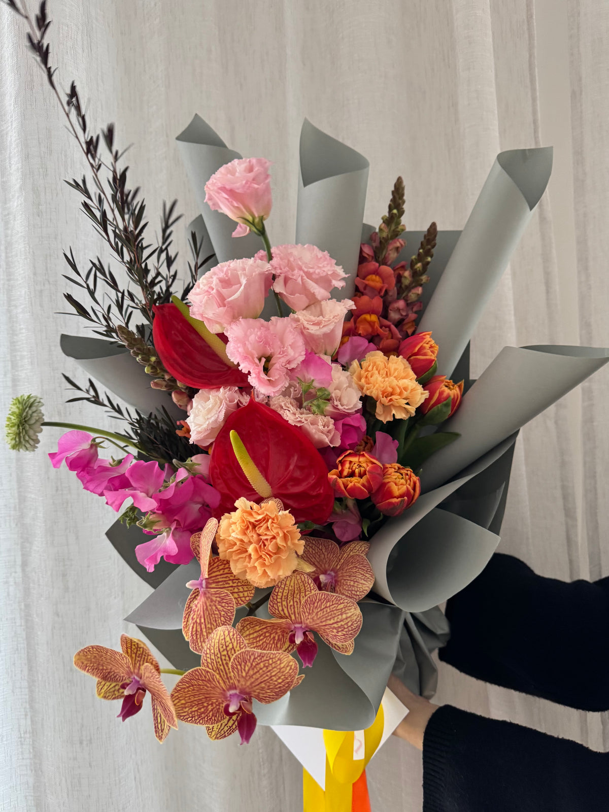 Luxury florist’s choice bouquet with orchids, anthuriums, tulips and seasonal flowers by Abloom Melbourne