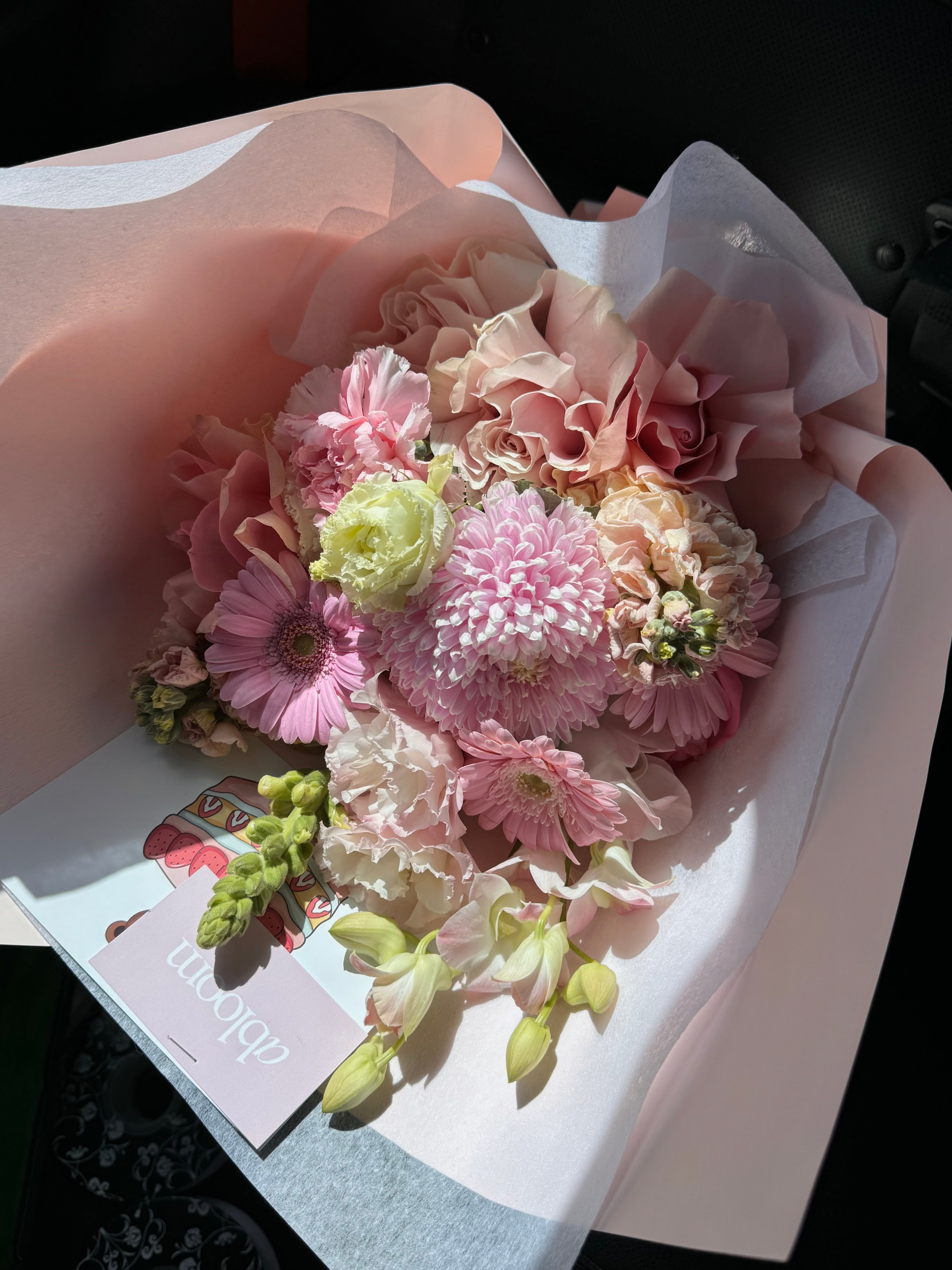 Bouquet of pink and green flowers 